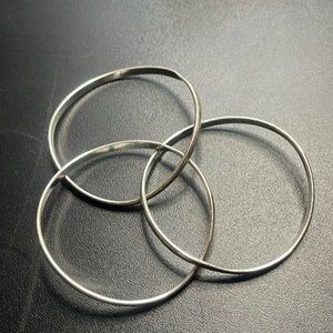 Unmarked , but tested for 925 tribracelet